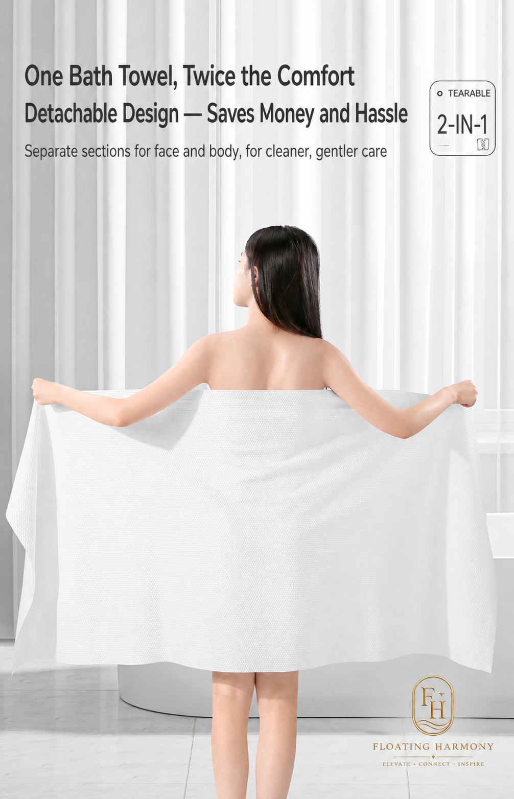 Guest holding an extra-large white disposable cotton bath towel